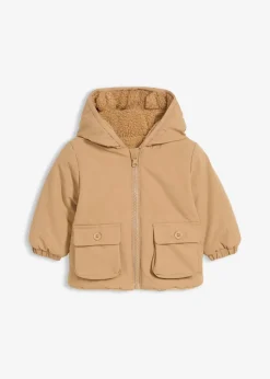 bonprix Jacken & Outdoor|Shirts & Pullover|Baby Wendejacke mit Kapuze mattcamel