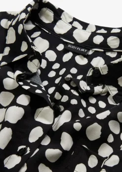 bonprix Blusen & Tuniken|Nachhaltigere Materialien|Bedruckte Longbluse aus nachhaltiger Viskose schwarz/wollweiß gepunktet
