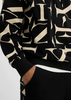 bonprix Große Größen|Sweat|Kapuzensweatshirt aus Bio Baumwolle, Loose Fit schwarz/hellsand bedruckt