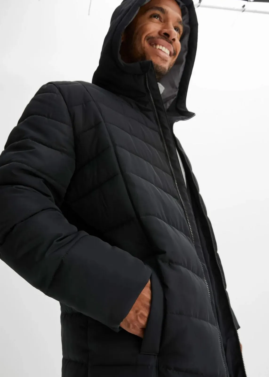 bonprix Große Größen|Jacken & Mäntel|Langer Steppmantel mit Kapuze schwarz