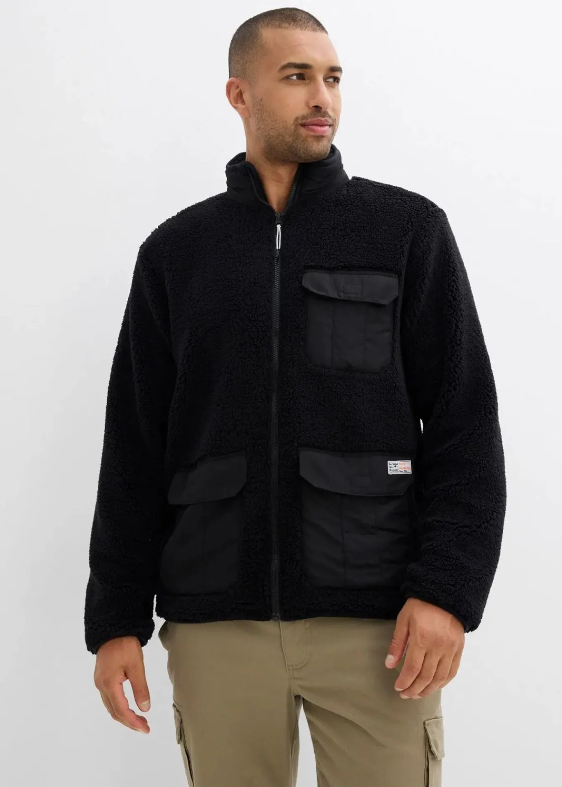 bonprix Große Größen|Sweat|Teddy-Fleece Jacke mit praktischen Taschen und sportiven Details schwarz