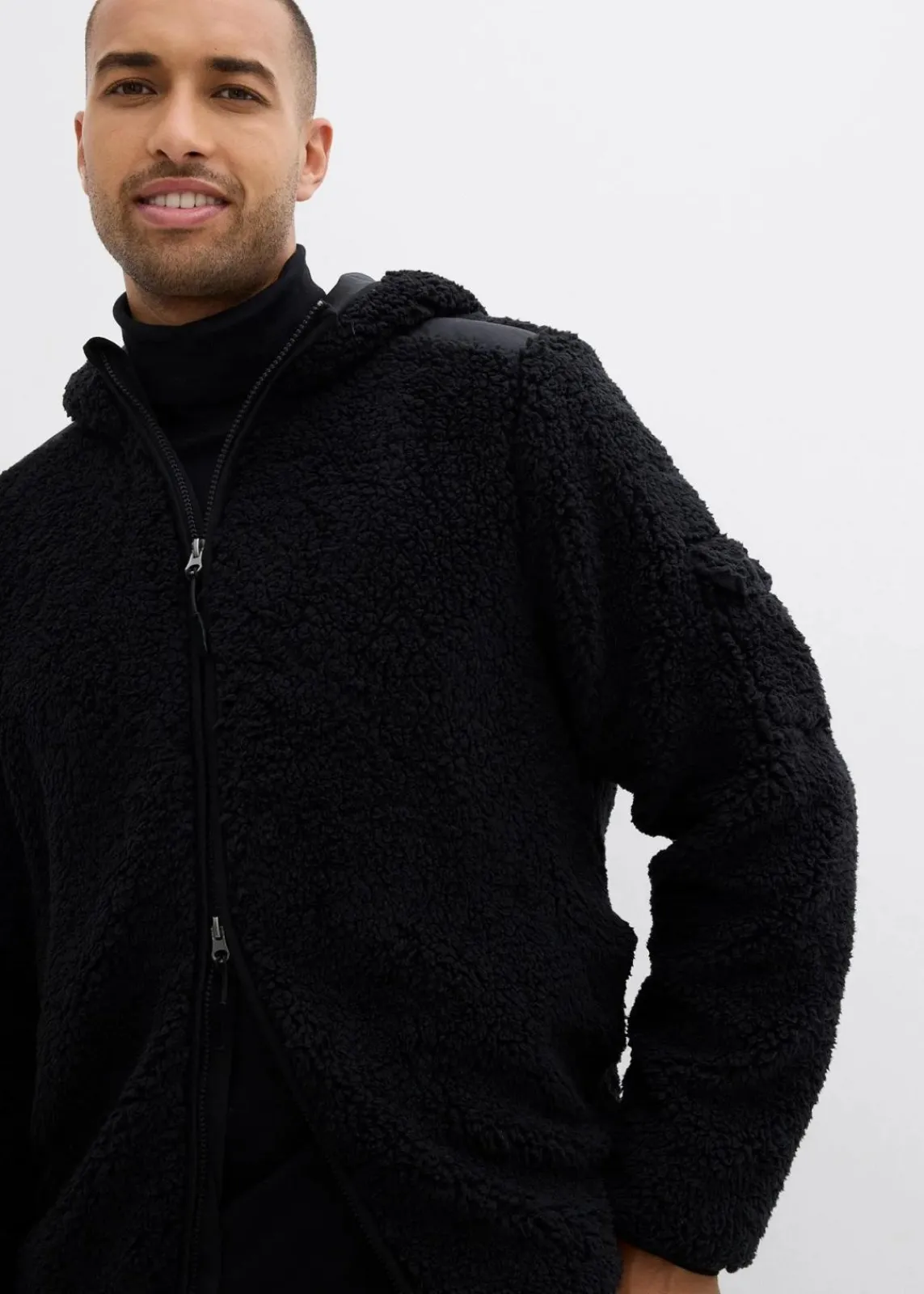 bonprix Große Größen|Outdoorbekleidung|Teddy-Fleece Jacke mit Web-Besatz und Kapuze schwarz