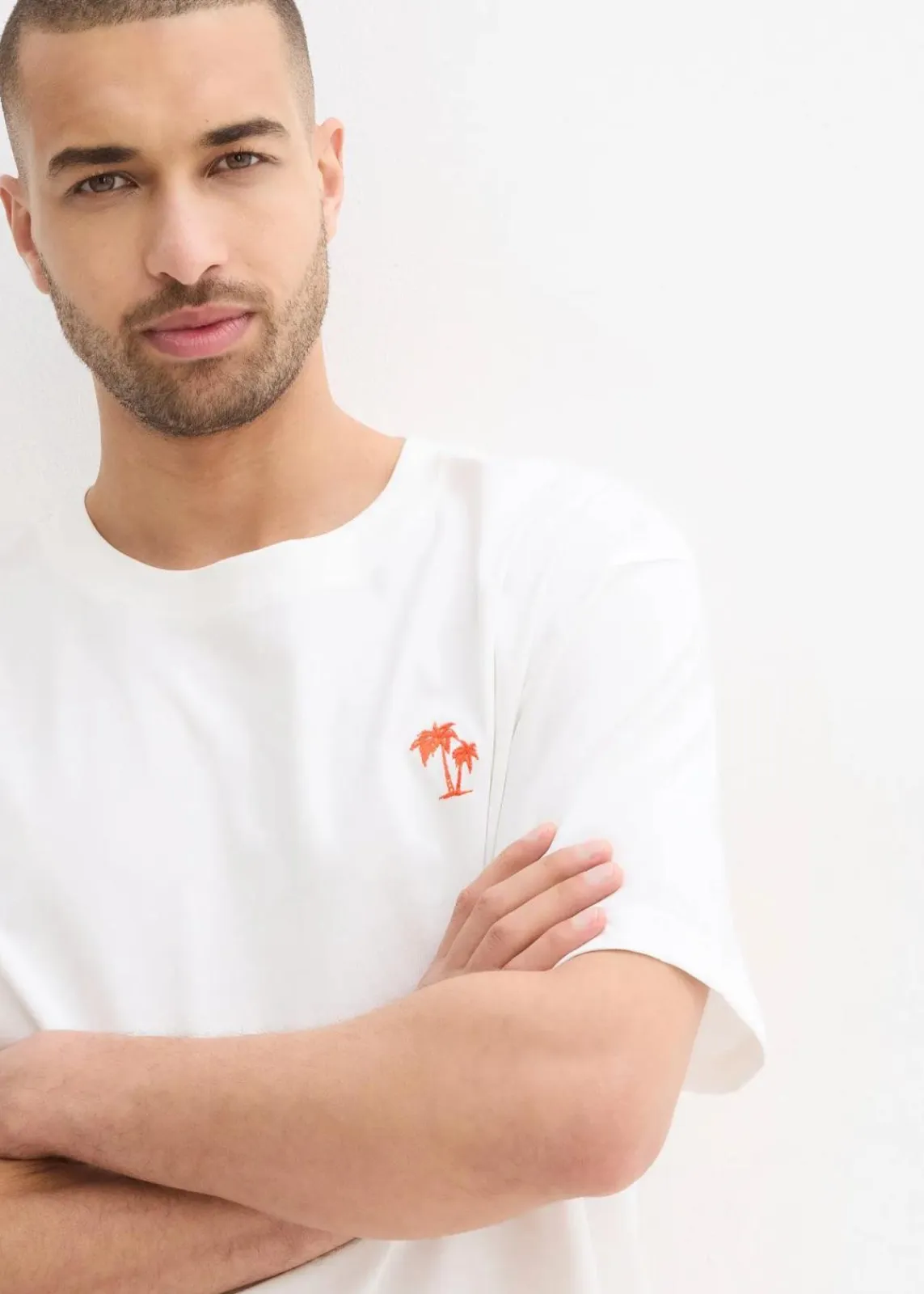 bonprix Strandmode|Große Größen|T-Shirt mit Rückenprint, Loose Fit wollweiß bedruckt