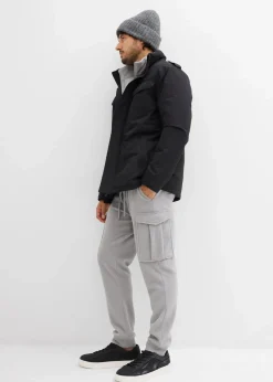 Wasserdichte Funktionsjacke mit Roll-in-Kapuze und Schulterklappen|bonprix Online