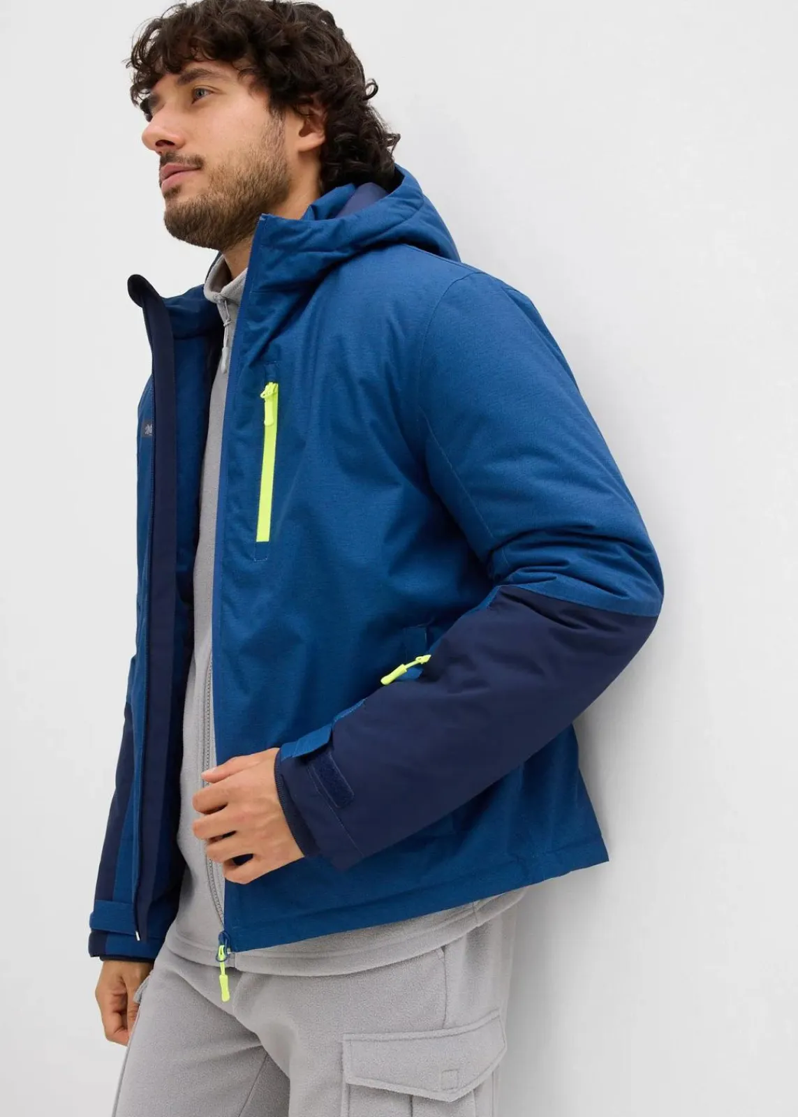 bonprix Große Größen|Outdoorbekleidung|wasserdichte Winter-Funktionsjacke blau/dunkelblau/gelb meliert